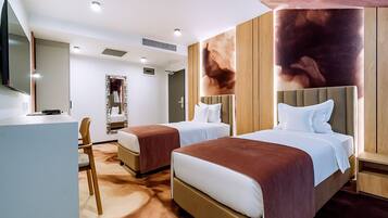 2 bedrooms, free minibar items, in-room safe, individually decorated