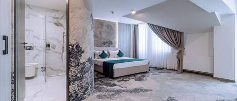 Mini-bar avec articles gratuits, coffres-forts dans les chambres