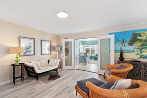 Signature House, 5 Bedrooms, Patio, Beach View | Living room | 65-inch Smart TV with digital channels - Crazy Crab (Gulf Shores)