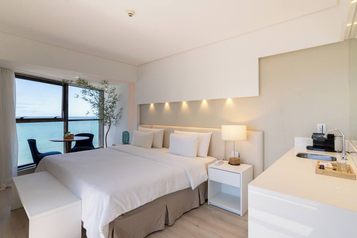 Suite – deluxe | Utsikt mot strand/hav
