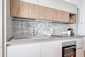 Appartement Familial, vue ville | Cuisine privée | Bouilloire électrique