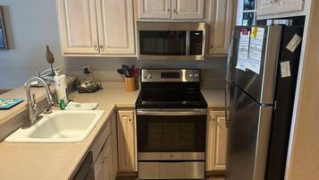 Fridge, microwave, dishwasher, coffee/tea maker