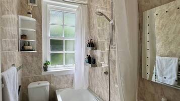 Hair dryer, towels, soap, shampoo