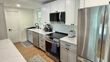 Villa, 4 Bedrooms | Private kitchen | Fridge, oven, coffee/tea maker, toaster