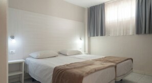 Departamento, balcón, vista al resort | Caja de seguridad en la habitación, wifi gratis y ropa de cama