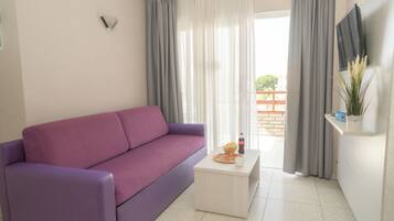 Apartment, Balcony, Resort View | Living area