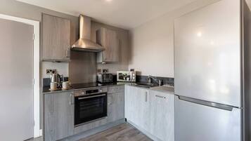 Apartment, 2 Bedrooms | Private kitchen | Full-sized fridge, microwave, oven, stovetop
