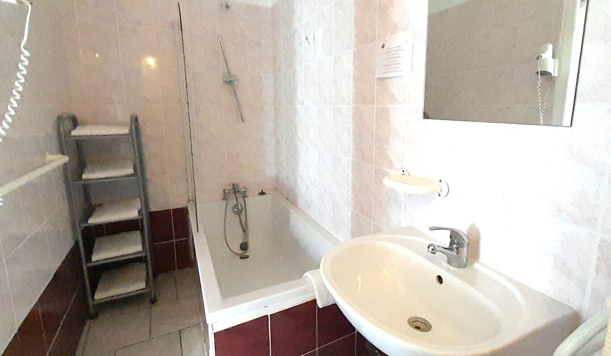 Hair dryer, towels, toilet paper