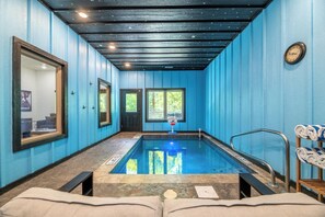 Indoor pool, a heated pool - *Stunning 4BD Lodge w/ POOL + Hot Tub + Near TOWN* (Pigeon Forge)