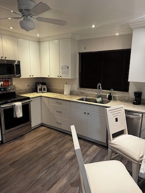 Full-size fridge, microwave, oven