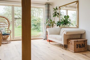 Casa, varanda coberta, vista para o jardim | Área de estar