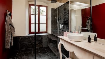 Shower, hair dryer, towels, soap
