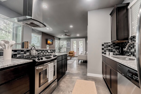 Oven, stovetop, cookware/dishes/utensils, dining tables