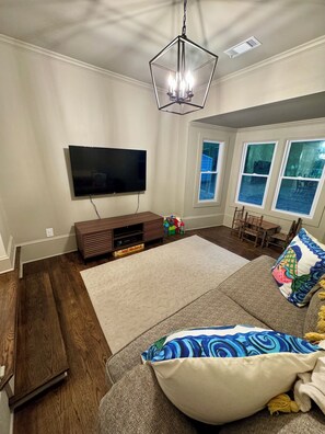 Smart TV, DVD player, books, video library
