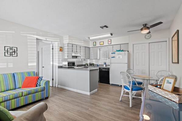 Townhome, 1 King Bed with Sofa bed (Capri by the Gulf 104) | Living area | TV