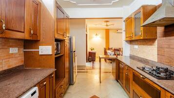 Fridge, microwave, stovetop, cookware/dishes/utensils