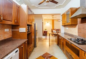 Fridge, microwave, stovetop, cookware/dishes/utensils