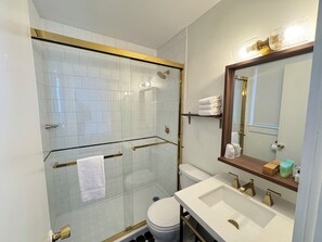 Hair dryer, towels, soap, toilet paper