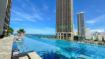 Outdoor pool, pool umbrellas, pool loungers