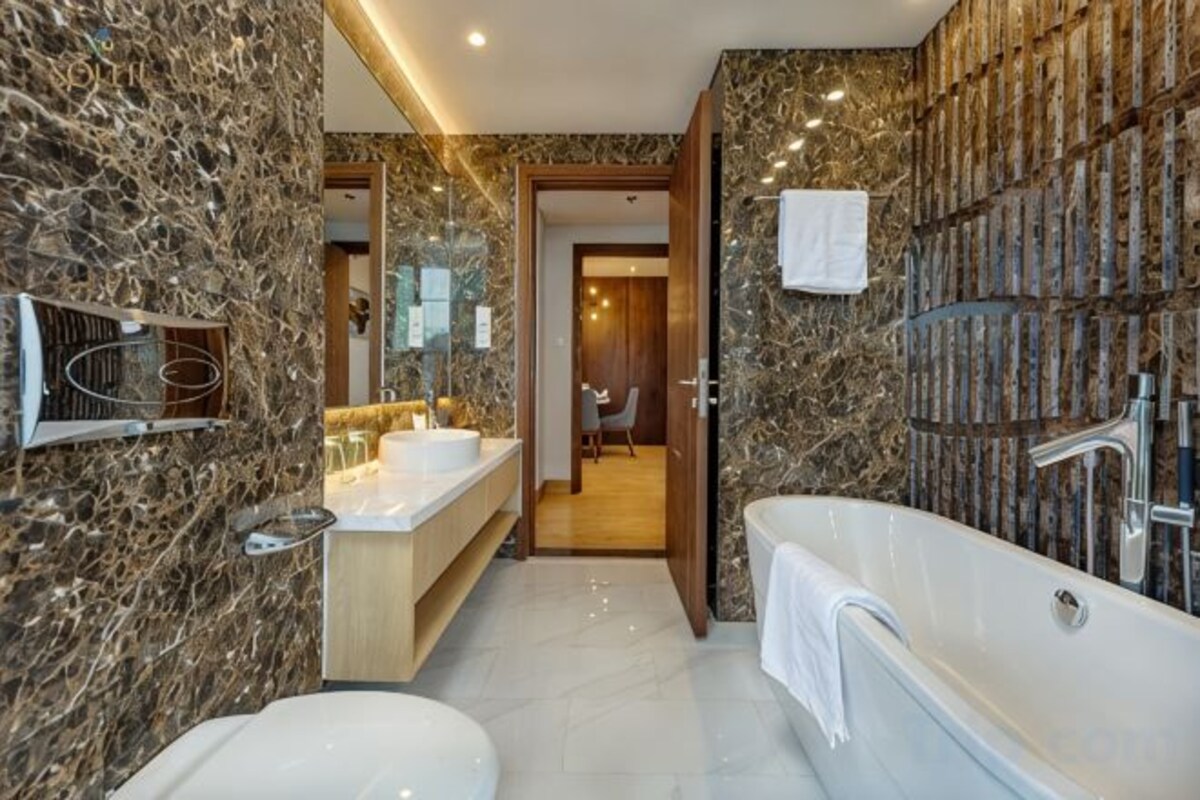 Hair dryer, bathrobes, slippers, towels