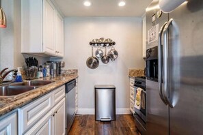 Fridge, microwave, oven, stovetop - Charming & Cozy Condo • Pool-Spa & Pac-Man Arcade (Indio)