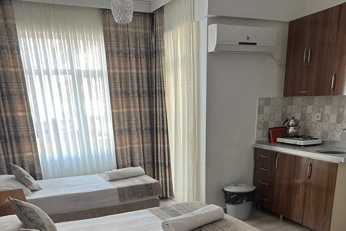 Economy Room, 1 Bedroom | 2 bedrooms, iron/ironing board, free WiFi