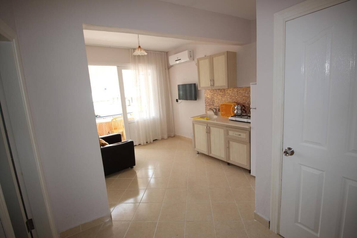 Deluxe Apartment, Balcony, Beach View | Living area