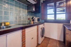 Microwave, stovetop, coffee/tea maker, toaster