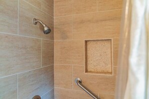 Shower, towels, soap, toilet paper