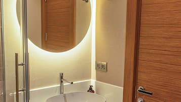 Frette Italian sheets, premium bedding, minibar, laptop workspace