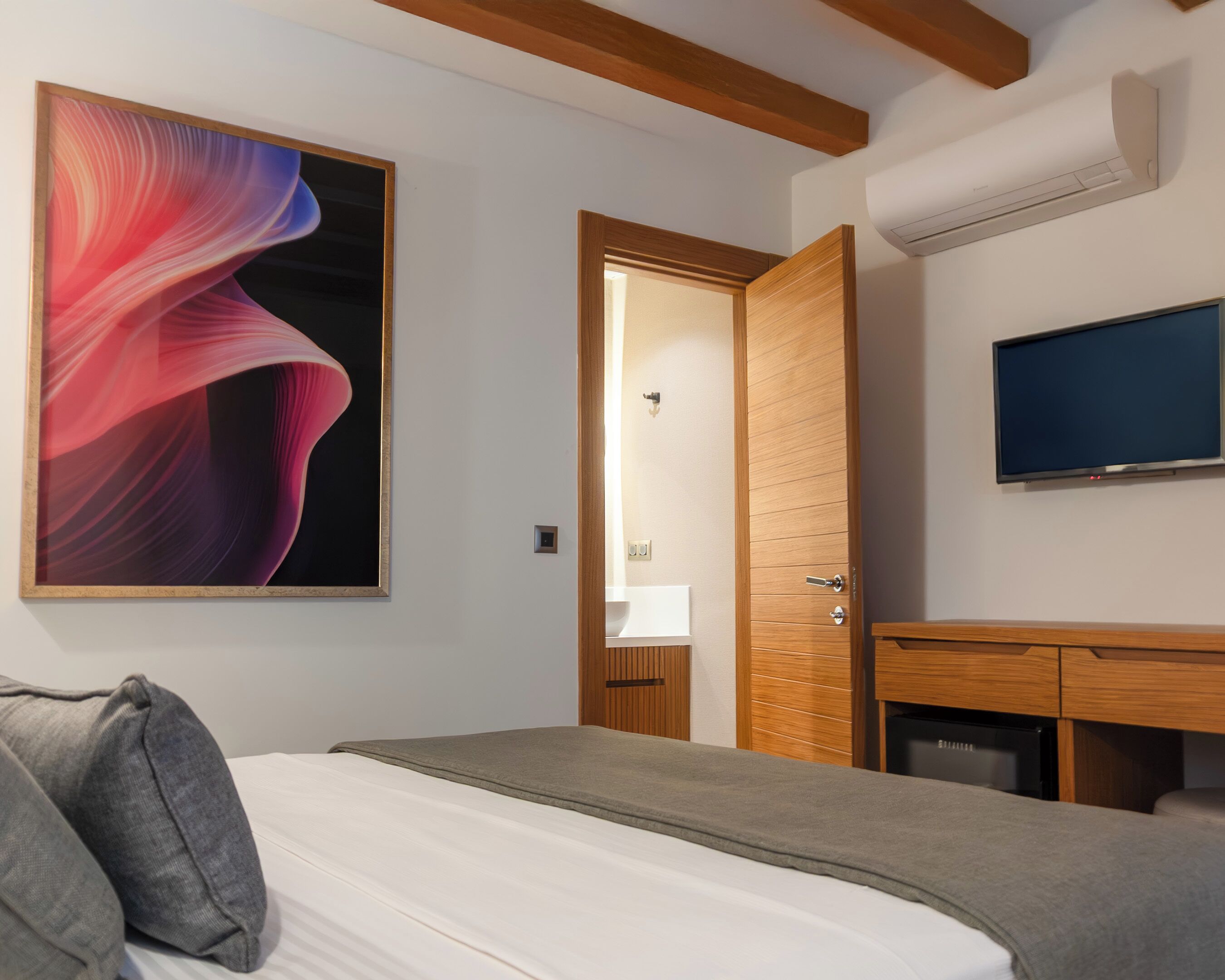 Standaard kamer | Italiaanse Frette-lakens, luxe beddengoed, een minibar
