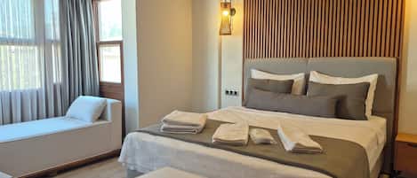 CUMBALI | Frette Italian sheets, premium bedding, minibar, laptop workspace