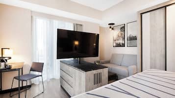 Family Room, 1 King Bed with Sofa bed (Deluxe) | Living area | 40-inch flat-screen TV with satellite channels