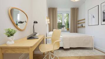 1 bedroom, desk, iron/ironing board, travel crib