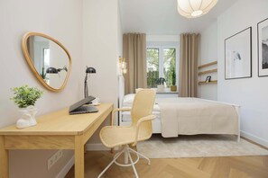 1 bedroom, desk, iron/ironing board, travel crib