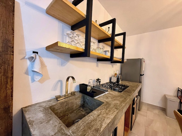 Fridge, microwave, stovetop, coffee/tea maker
