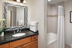 Shower, jetted bath, hair dryer, towels