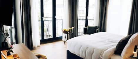 Deluxe Studio, Courtyard View | In-room safe, desk, laptop workspace, free WiFi