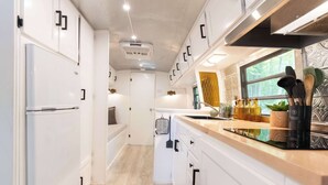 Coffee/tea maker, fridge, stovetop, electric kettle