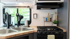 Coffee/tea maker, fridge, microwave, oven - Family Glamping RV • Springdale Retreat Tobermory (Miller Lake)