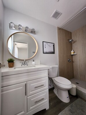 Shower, towels, soap, toilet paper