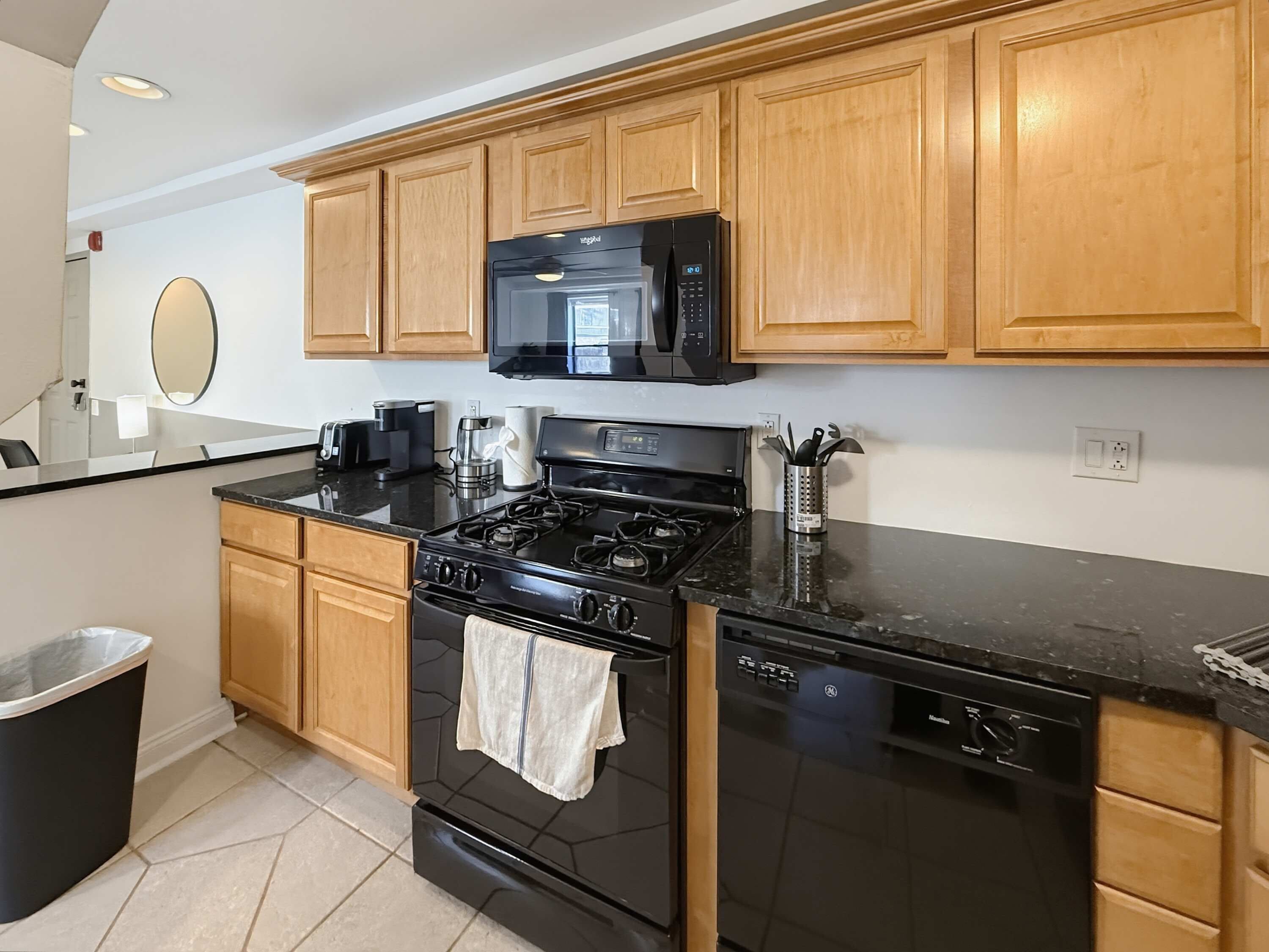 Coffee/tea maker, fridge, microwave, oven