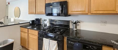 Coffee/tea maker, fridge, microwave, oven