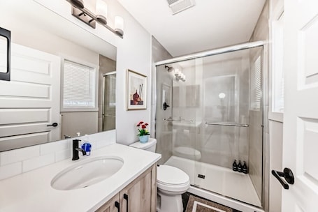 Shower, hair dryer, towels, soap. Cozy beautiful house