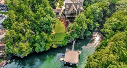 Charming 3-bedroom lake house with outdoor recreation space and a large dock.