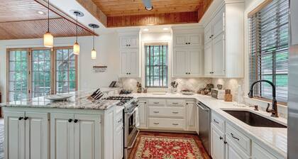 Charming 3-bedroom lake house with outdoor recreation space and a large dock.