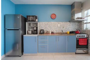 Comfort Apartment, Balcony | Private kitchen | Full-size fridge, microwave, oven, stovetop