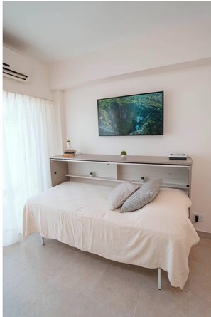 Comfort Apartment, Balcony | Living area - Confort en Av Corrientes (Buenos Aires)