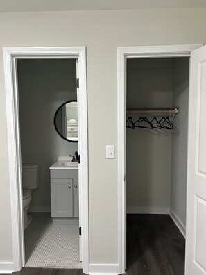 Shower, towels, soap, toilet paper