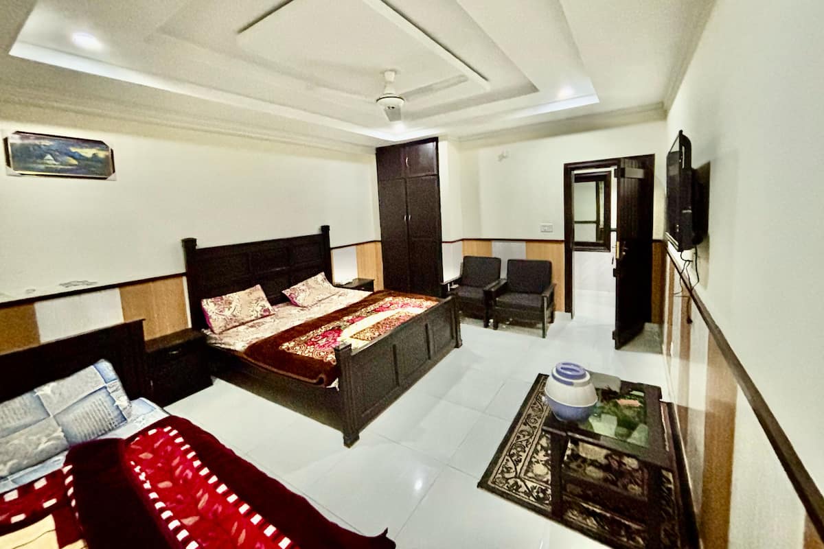 Habitación Deluxe, balcón, vistas a la montaña | Zona de estar